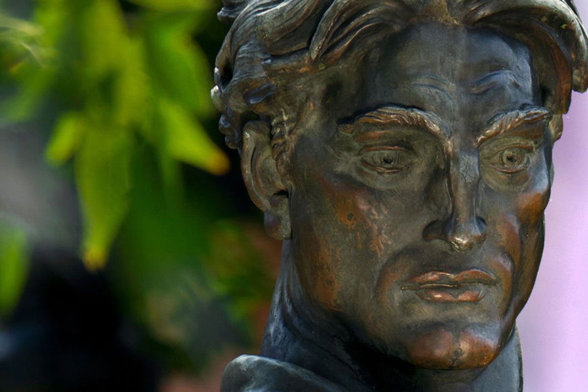 A closeup of the Mountaineer statue's face.