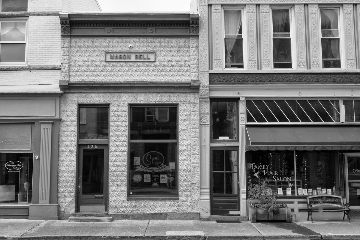 Black and white photo of buildings in downtown Lewisburg