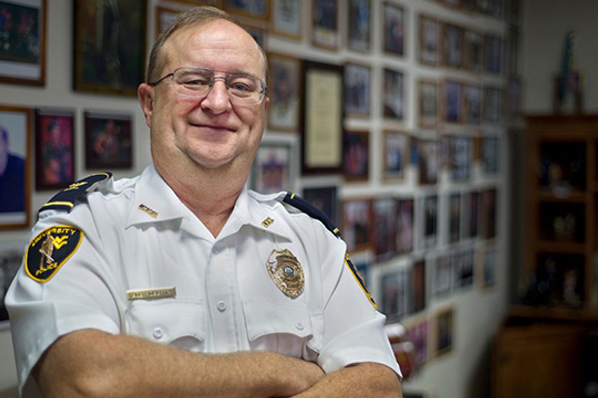 Chief Bob Roberts smiles as he is photographed in his office in December 2011.