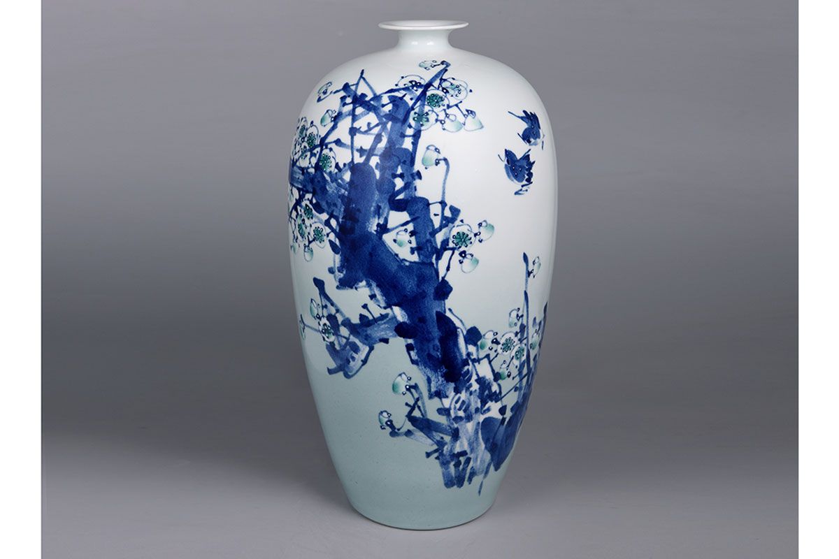 A beautiful white and blue vase.